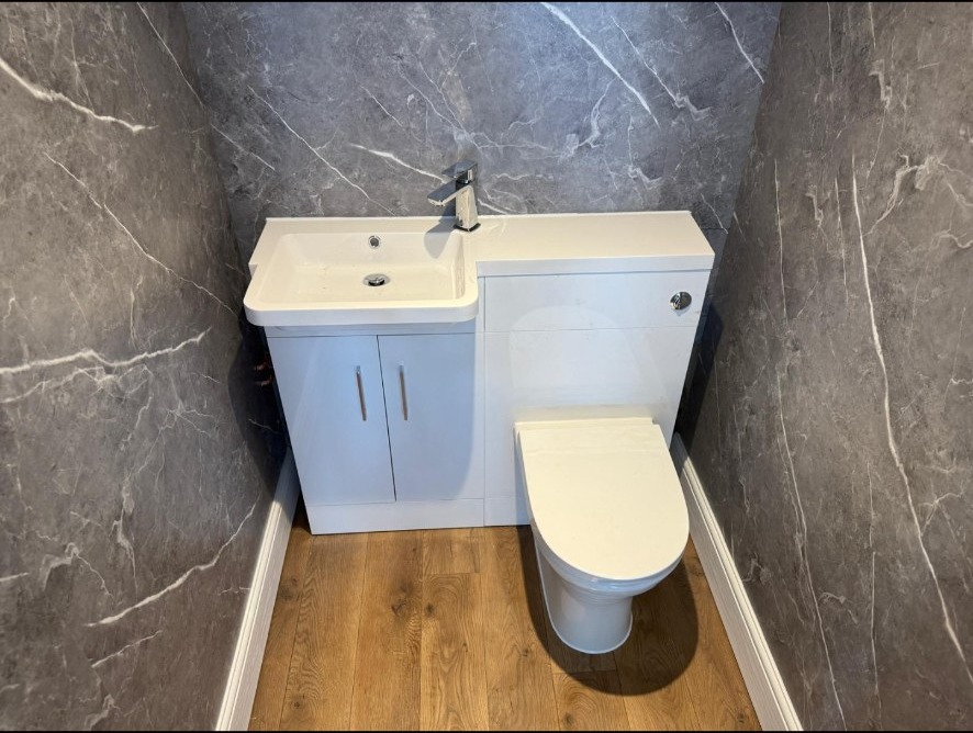 Cloakroom, marble-effect panels